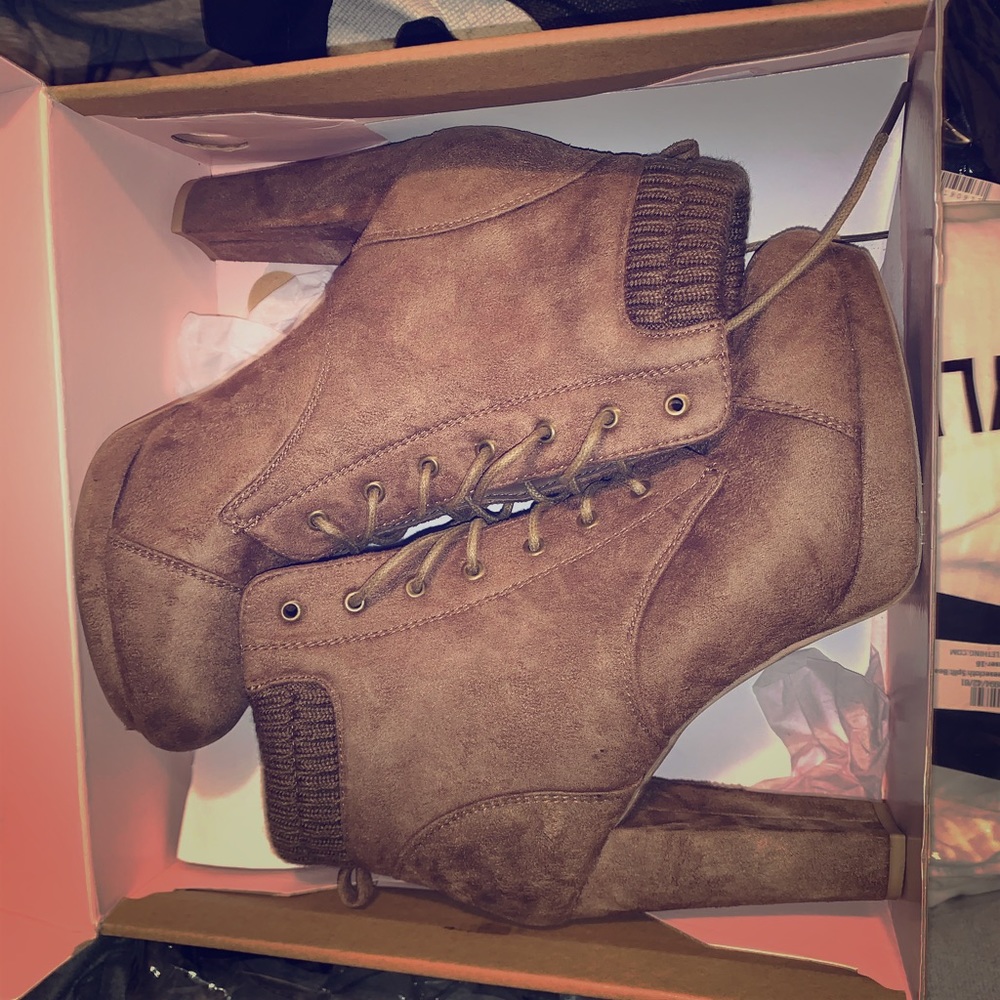 Women’s taupe heeled lace up booties